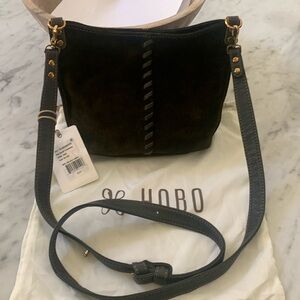 Hobo small crossbody . Green suede 100% leather.